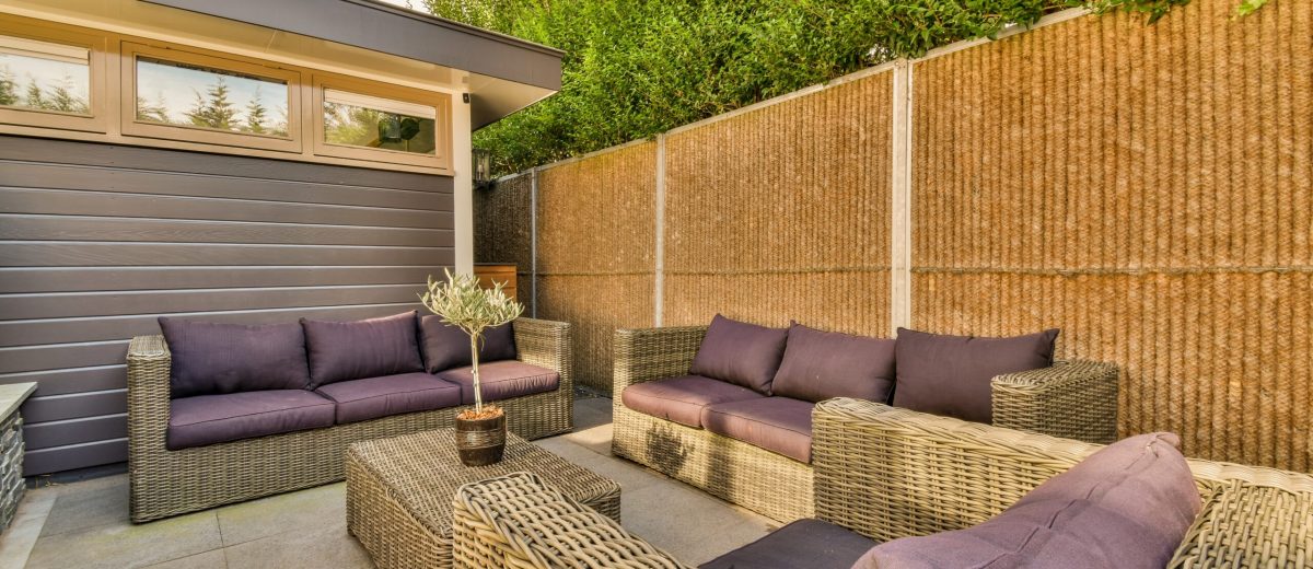 Patio and fence in garden.